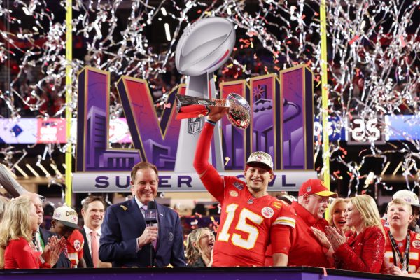 LAS VEGAS, NEVADA - FEBRUARY 11: Patrick Mahomes #15 of the Kansas City Chiefs holds the Lombardi Trophy after defeating the San Francisco 49ers 25-22 during Super Bowl LVIII at Allegiant Stadium on February 11, 2024 in Las Vegas, Nevada. (Photo by Jamie Squire/Getty Images)